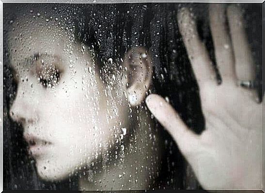 Woman-palm-open-on-a-window