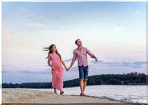 A couple walking on a beach