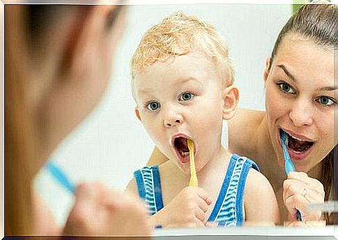 child brushing teeth