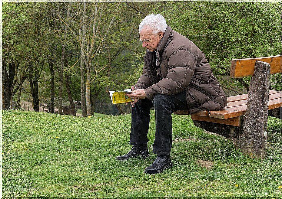 elderly person reading